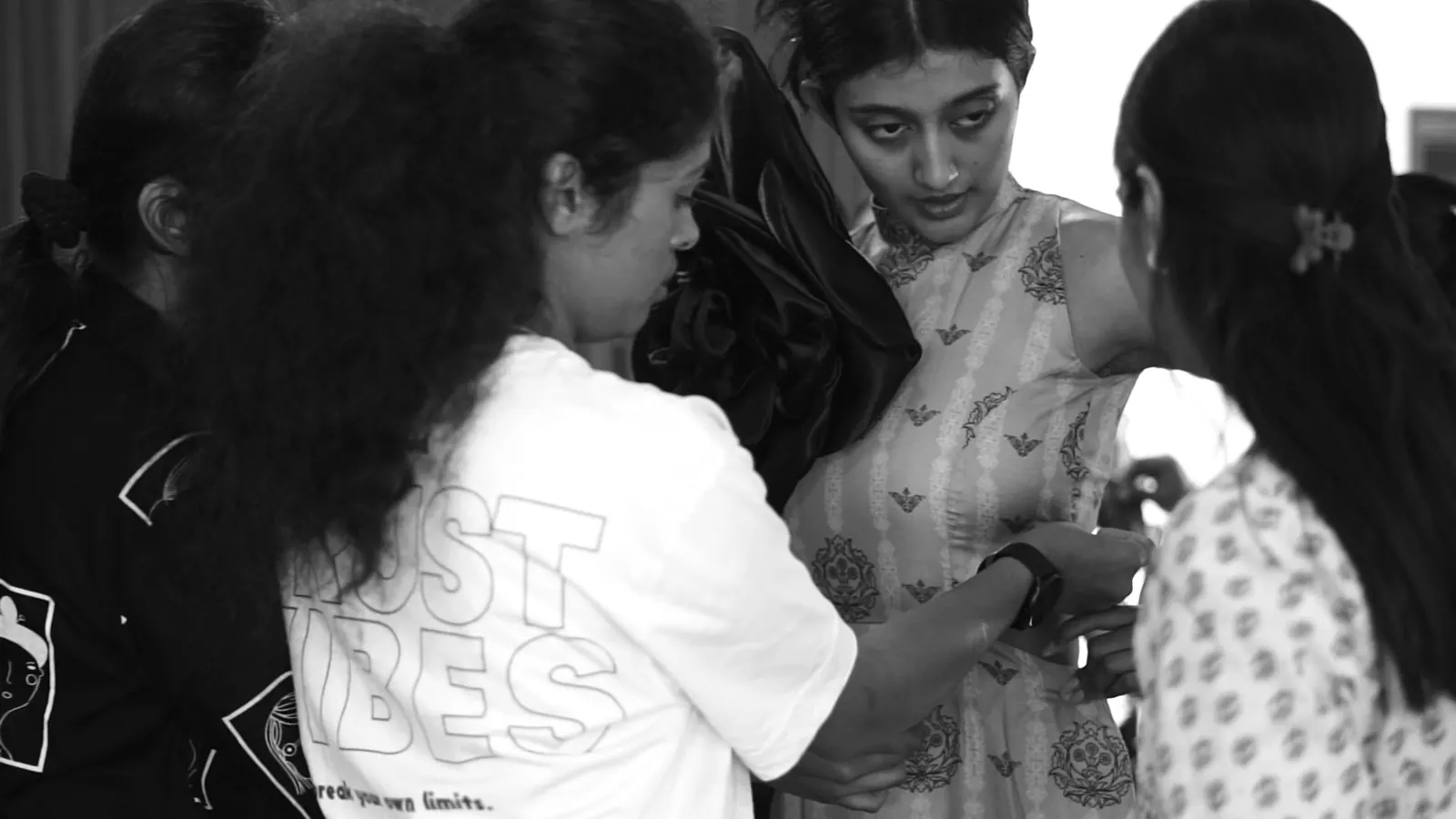 A final fitting backstage before the show